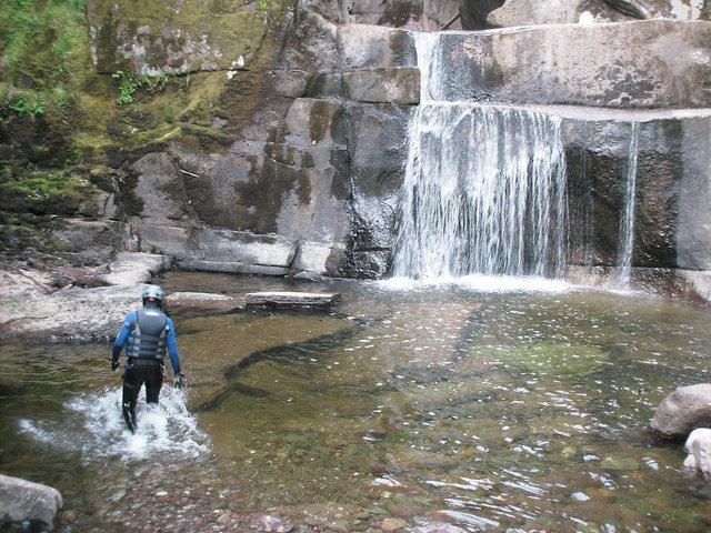 Water flowing through the wooded gorge at Bracklinn Falls near Callander.