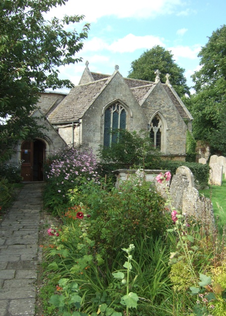 Stone church and flower-lined path at St Mary’s in Edith Weston