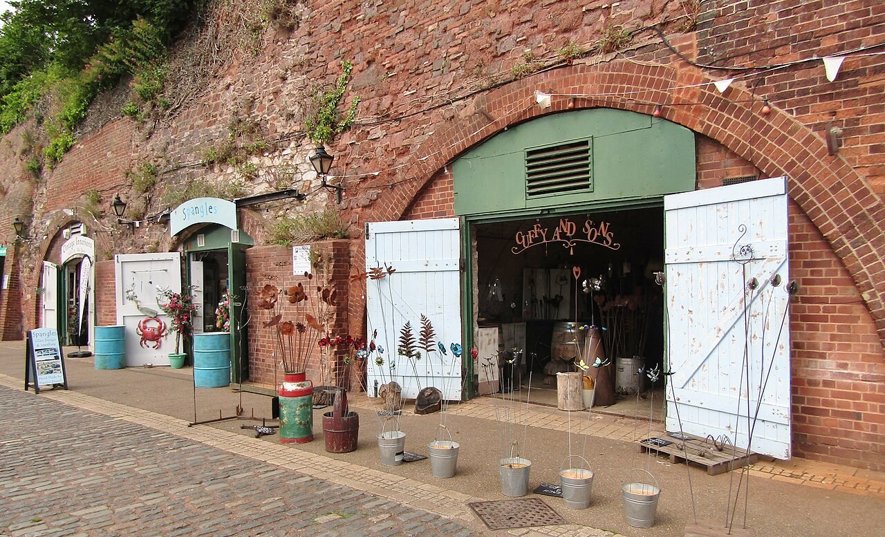 Shops in the brick-vaulted arches along Exeter’s historic quayside