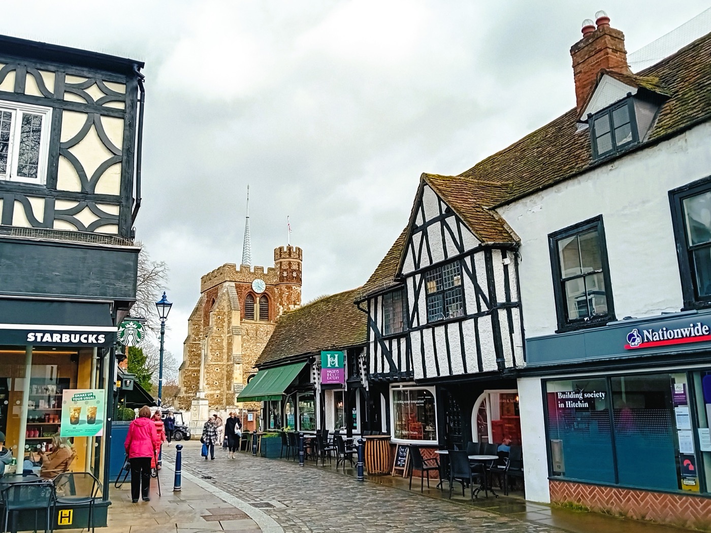 St Mary's Church and the town-centre street seen from Market Place in Hitchin