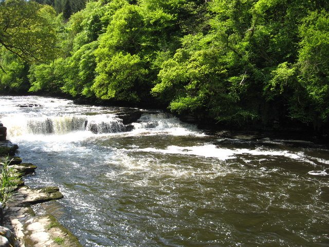 Wooded gorge and waterfall on the River Clyde at New Lanark.
