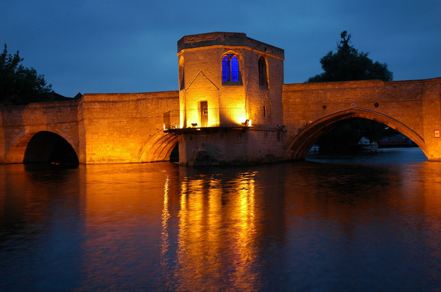 Historic bridge over the Great Ouse at St Ives, Cambridgeshire, lit at dusk